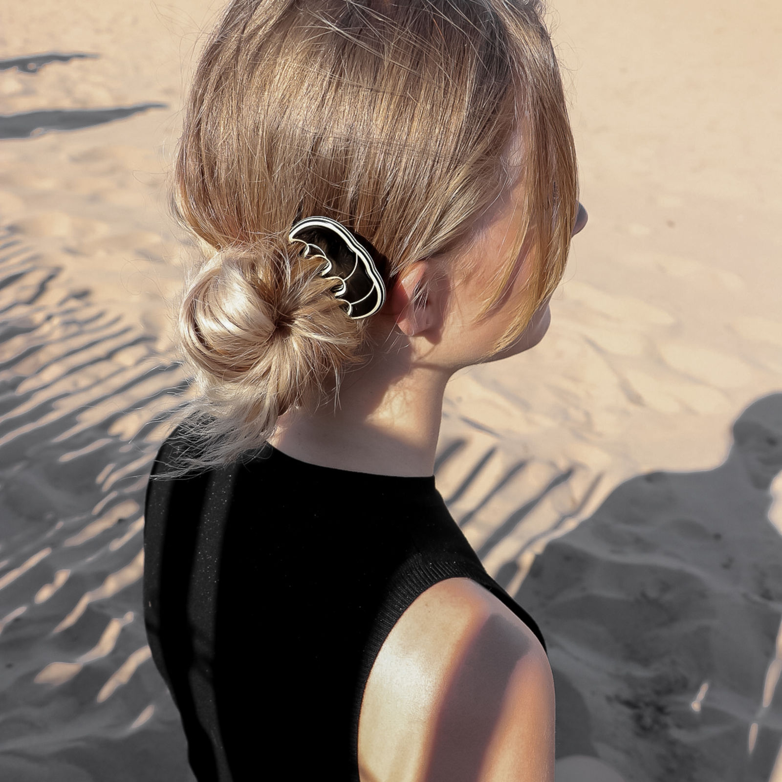 Queue de cheval enroul&eacute;e avec pince, coiffure loop tendance